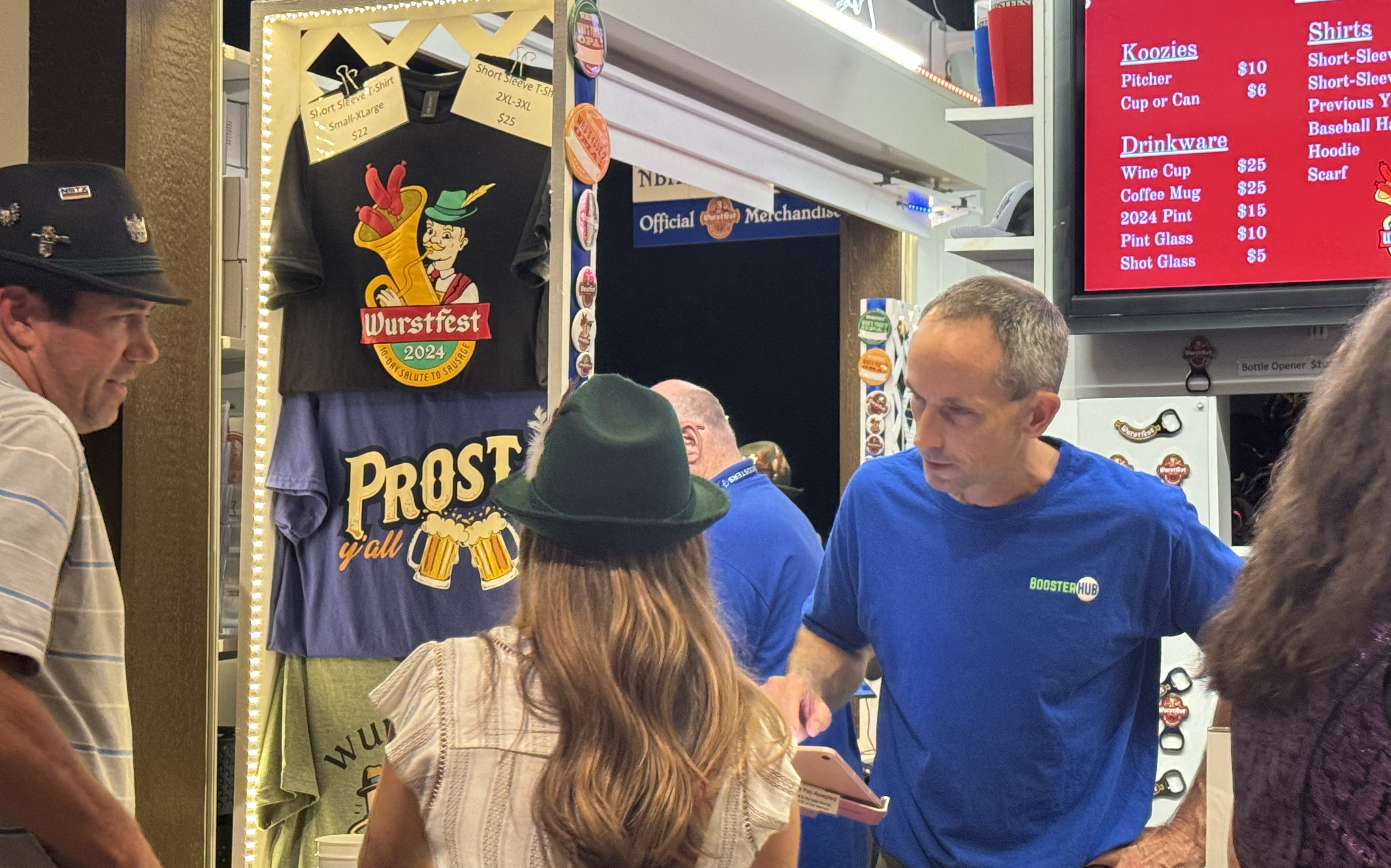 Trevor Eissler volunteers for NBHS Marching Band at Wursfest.